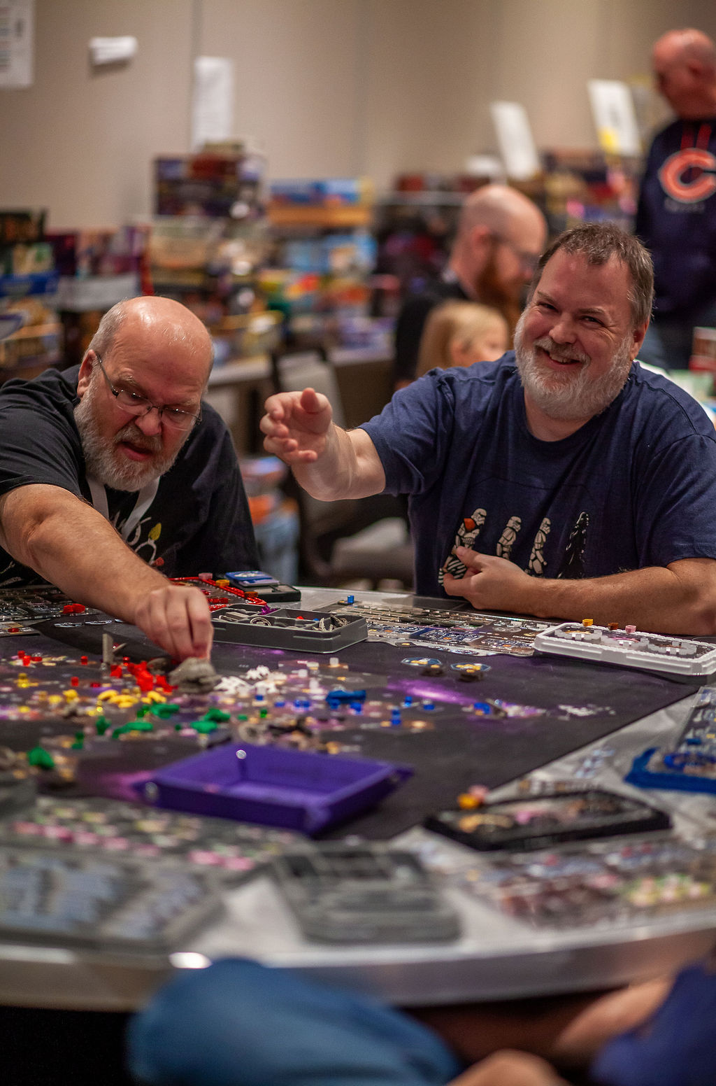 People playing board games