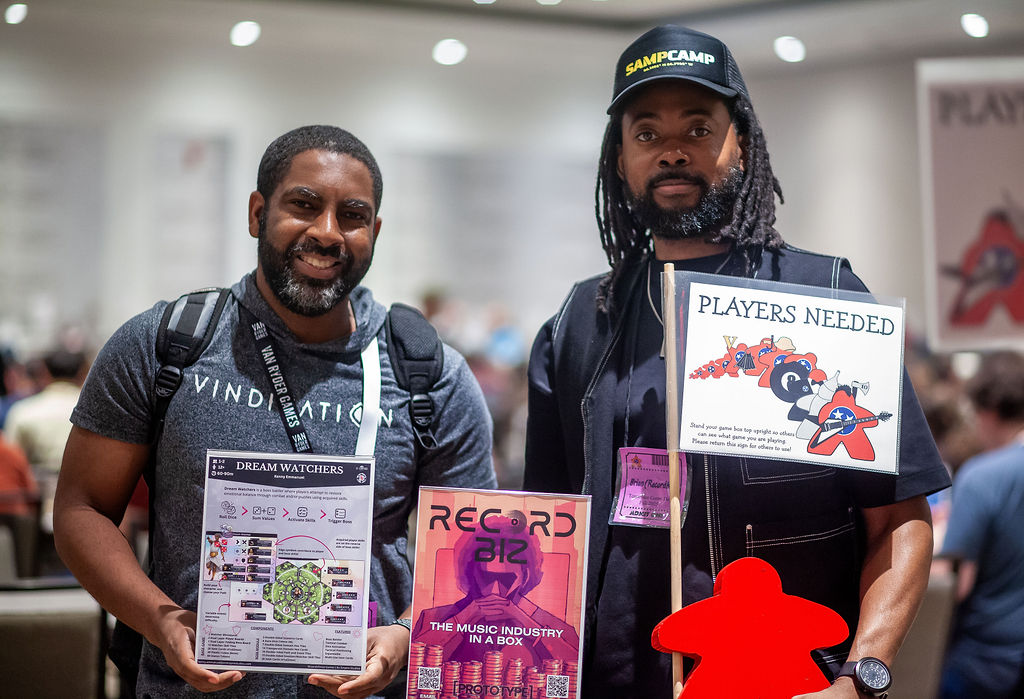 Gamers with Players Needed signs